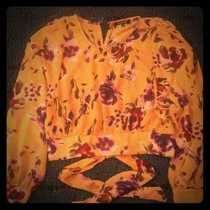 Wrap around floral mid drift top